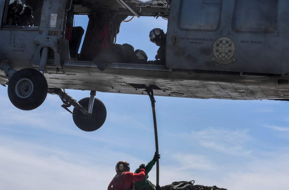 USS Wayne E. Meyer Performs a Vertical Replenishment-at-Sea in the South China Sea