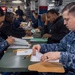 Sailors participate in the Navywide advancement exams aboard USS Bonhomme Richard (LHD 6)