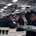 Sailors participate in the Navywide advancement exams aboard USS Bonhomme Richard (LHD 6)