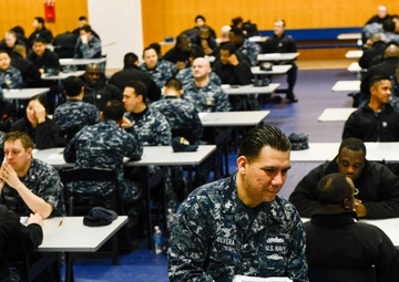 Personnel Specialist 1st Class David Olvera Administers a Petty Officer First Class Advancement Exam to Ronald Reagan Sailors at James D. Kelly Fleet Recreation Center