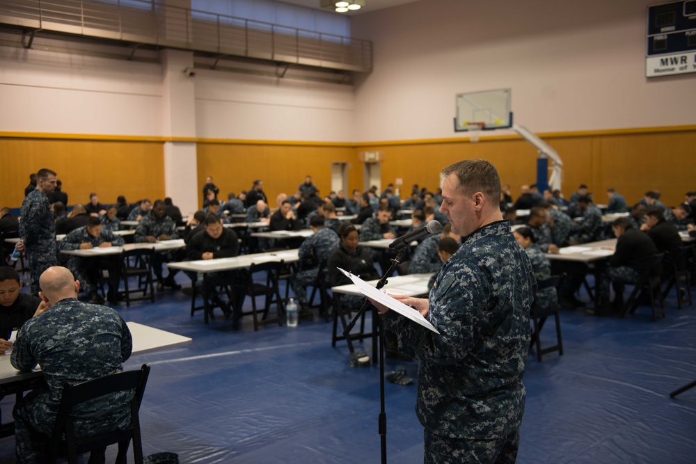 Reads Instructions to Ronald Reagan Sailors Before a Petty Officer First Class Advancement Exam at James D. Kelly Fleet Recreation Center