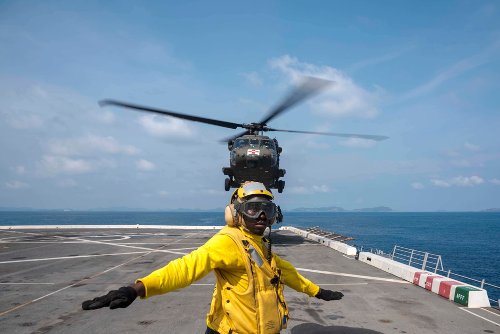 U.S. Army lands helicopters on USS Green Bay’s flight deck during Cobra Gold