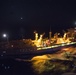 USS Bonhomme Richard (LHD 6) conducts nighttime replenishment at sea