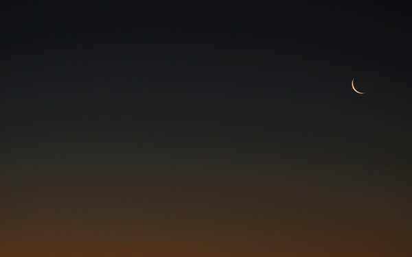 Crescent Moon Over Sunrise