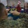 Marines read to children at Zukeren Elementary for Read Across DoDEA Day