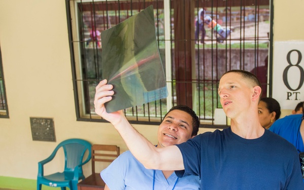 Reviewing X-ray images with host nation medical students at Continuing Promise 2017