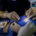 Cmdr. Christopher Crecelius Performs Surgery On The Eyelid of A Host Nation Patient at Continuing Promise 2017