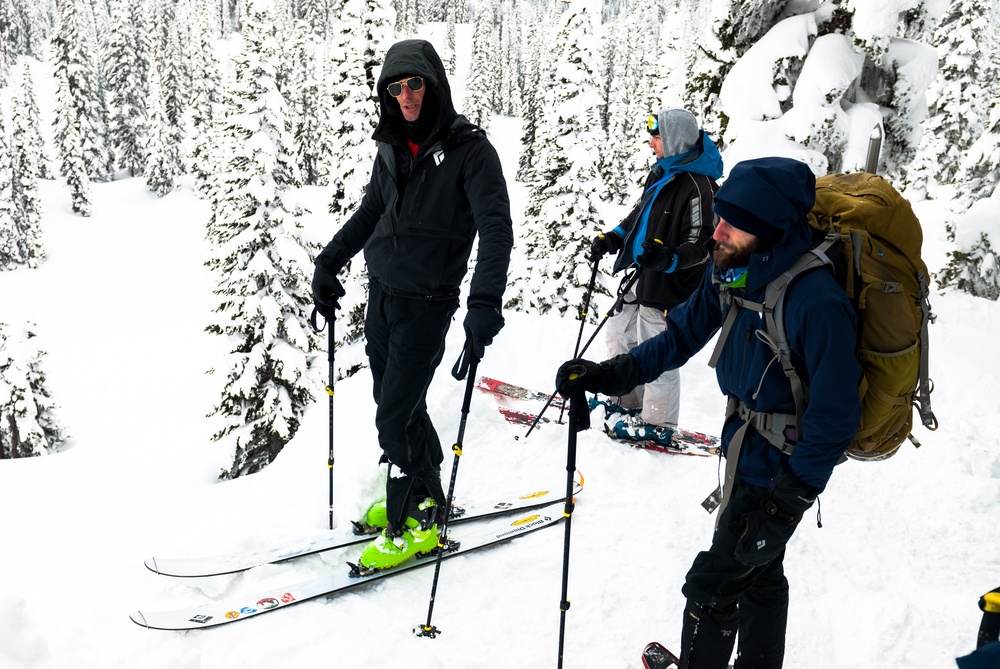 John Dorman explains backcountry skiing safety, at the JBLM Alpine Club basic alpine course, Mount Rainier National Park, Washington