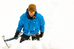 Joseph Byrnes pulls himself to safety during a simulated crevasse rescue, at the JBLM Alpine Club basic alpine course, Mount Rainier National Park, Washington