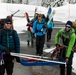 Mark Deschenes, left, and Derrick Pierson, carry a sled loaded with supplies at Mount Rainier National Park, Washington