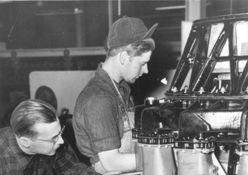 Mechanics work on Allison J33 jet engine at Tinker Air Force Base, Oklahoma
