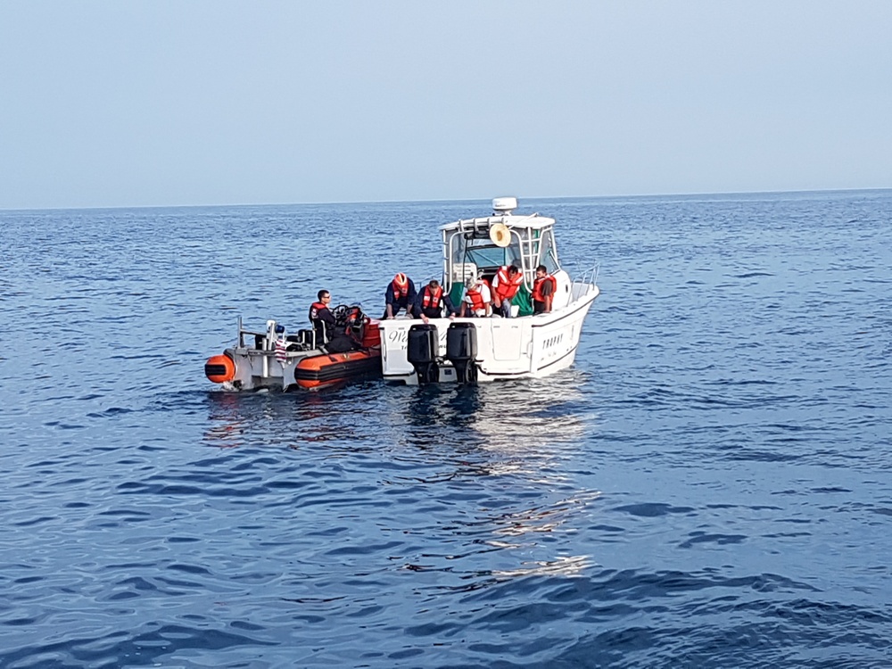 DVIDS - Images - Coast Guard Rescues 3 After Boat Floods 100 Miles ...