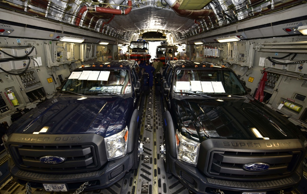 A view of two Coast Guard MSST boats aboard an Air Force C-17