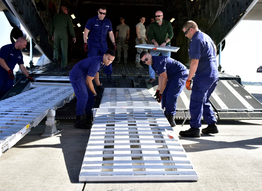 Coast Guard MSST Miami set up ramps on an Air Force C-17