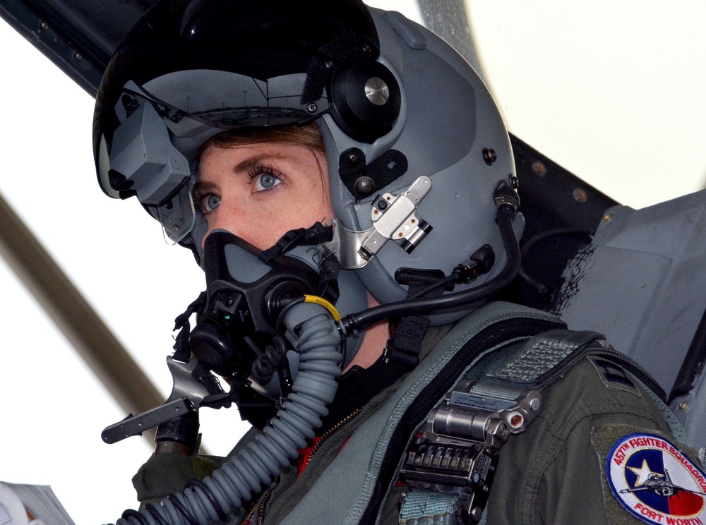 Female pilot prepares for flight