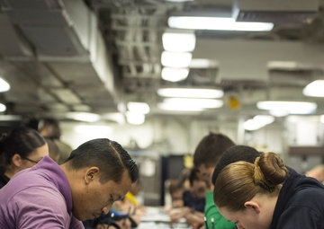 Makin Island Sailors Take E-5 Exam