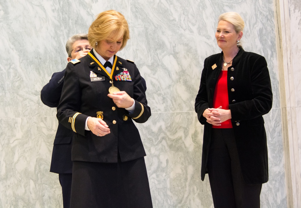 CW5 Wilson Receives Medal at Army Women's Hall of Fame Induction