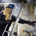 Engineering department boiler maintenance and nightly oil check aboard USS Bonhomme Richard