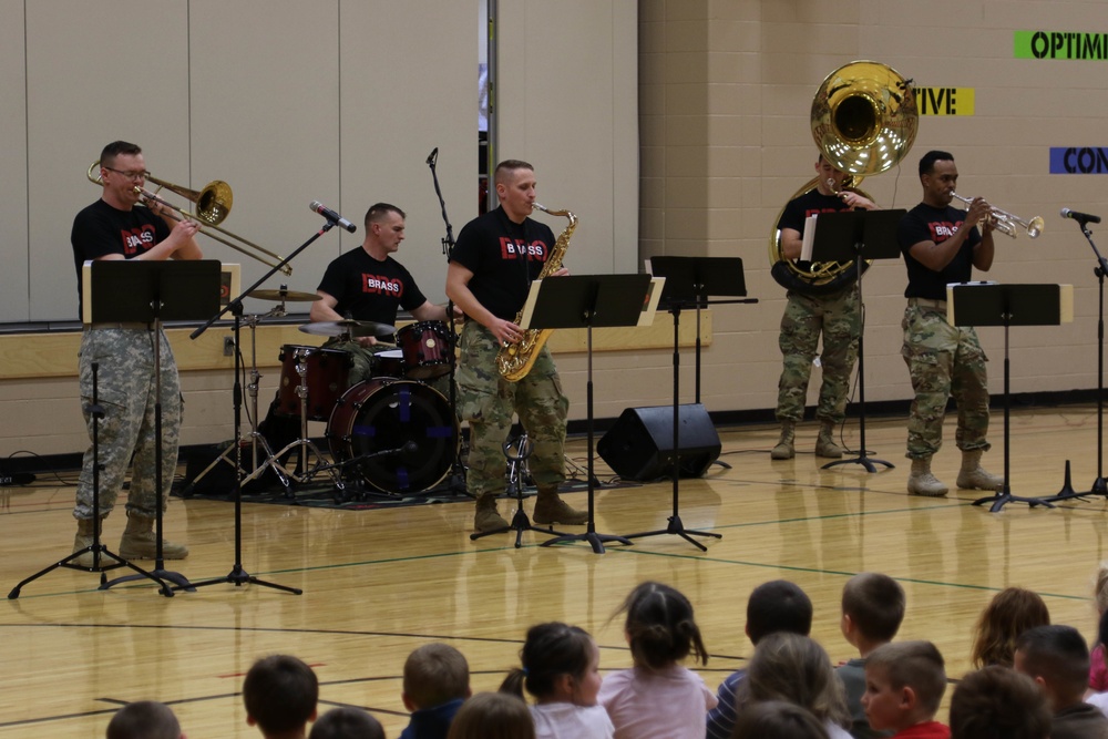 ‘Big Red One’ Brass Band perform during Music In Our Schools month