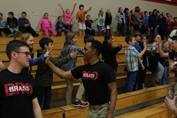 ‘Big Red One’ Brass Band perform during Music In Our Schools month