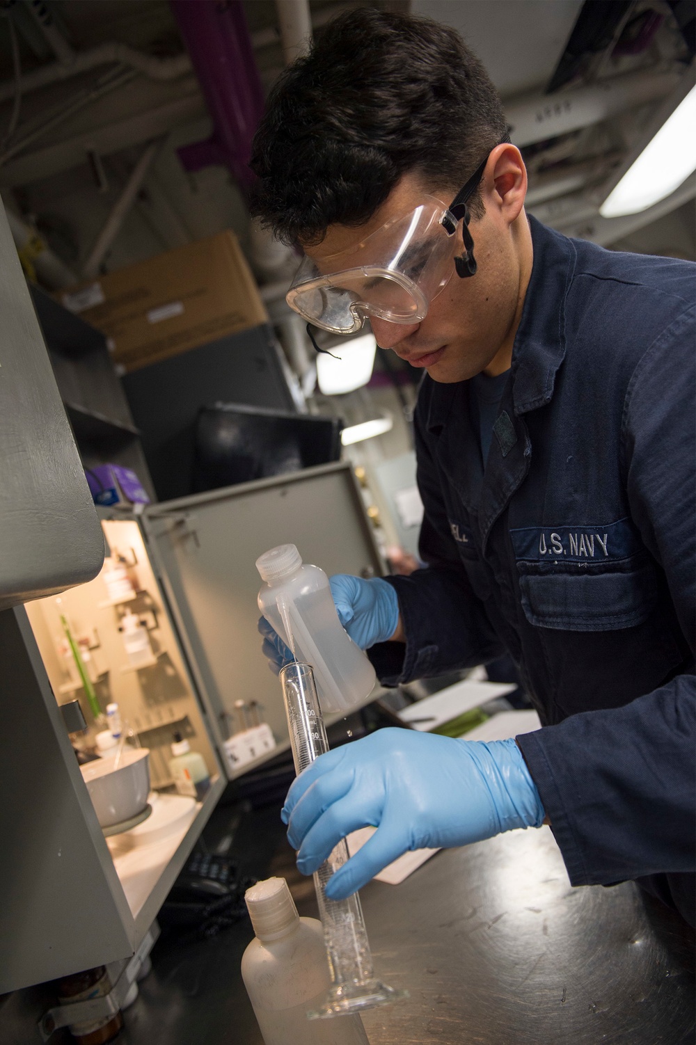 Nightly oil and water check aboard USS Bonhomme Richard