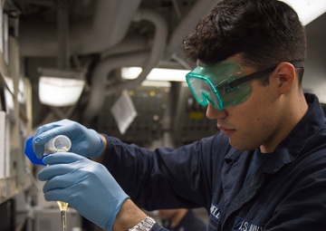 Nightly oil and water check aboard USS Bonhomme Richard
