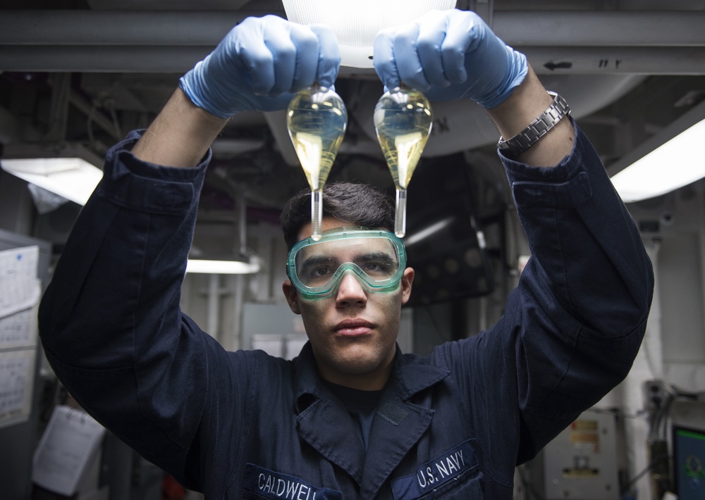 Nightly oil and water check aboard USS Bonhomme Richard