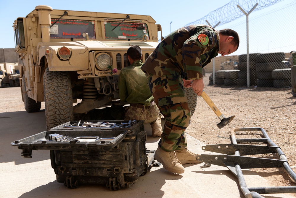 Afghan mechanics maintain critical vehicles in Helmand