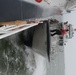 47-foot Motor Lifeboat comes alongside the Cutter John McCormick