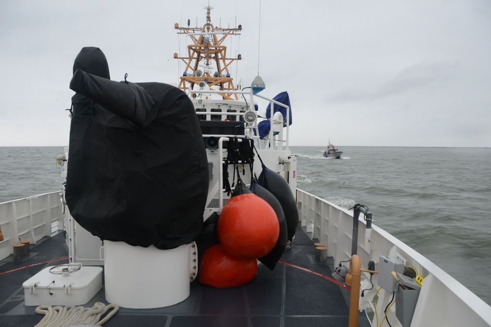 47-foot motor lifeboat comes alongside the Cutter John McCormick