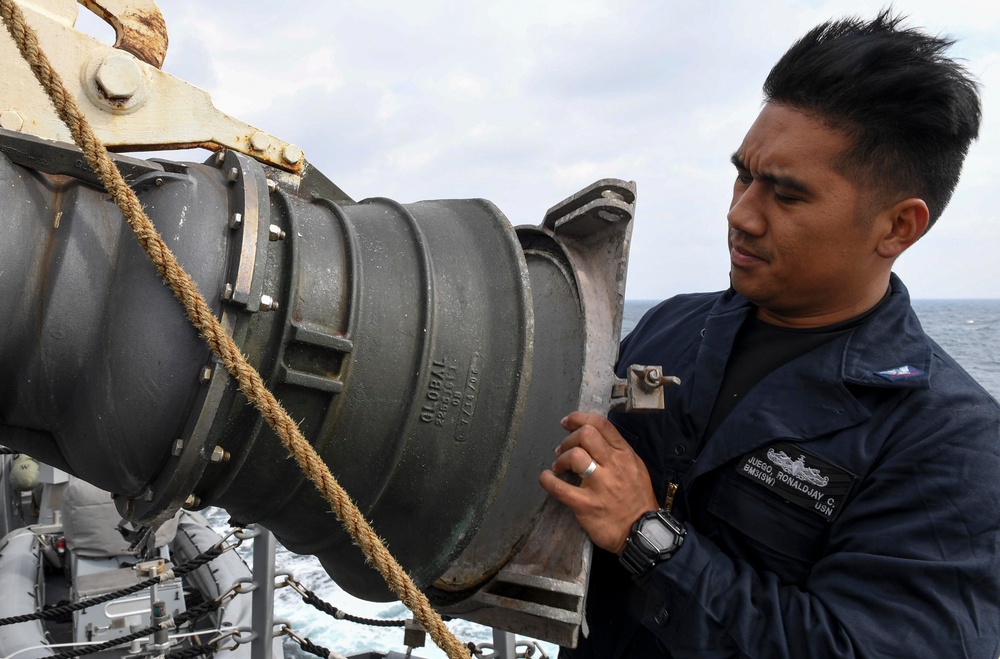 USS Wayne E. Meyer (DDG 108) Sailor prepares for Replenishment-at-Sea