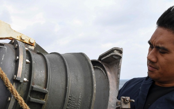 USS Wayne E. Meyer (DDG 108) Sailor prepares for Replenishment-at-Sea