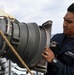 USS Wayne E. Meyer (DDG 108) Sailor prepares for Replenishment-at-Sea