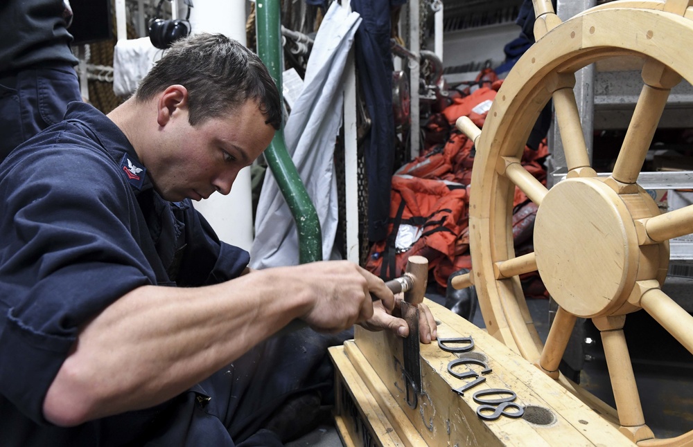 USS Wayne E. Meyer Works on Flag Staff Stand