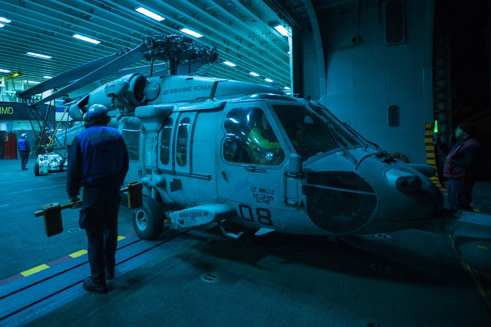Night check operations aboard USS Bonhomme Richard
