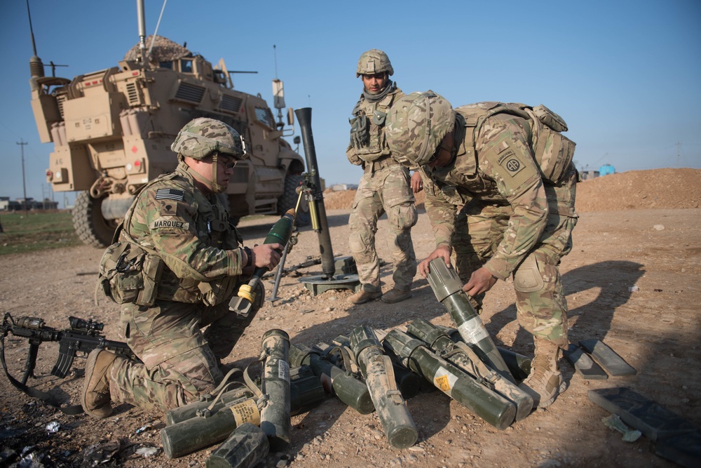 Coalition forces  conduct mortar fire mission