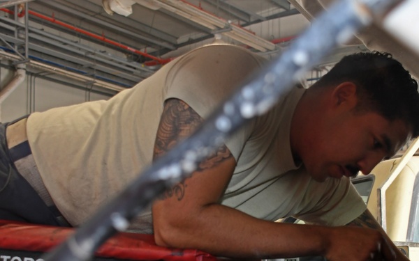 Air Force mechanics put wheels on the ground