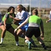 Ruck ‘n’ Roll: AF rugby program breaks gender barrier