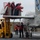 Sailors lifted by forklift