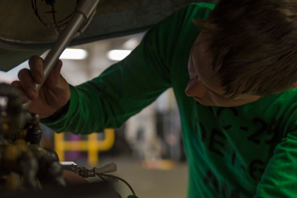 AM3 Conducts Inspection on MH-60S Sea Hawk