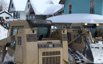 NY Army National Guard Engineers clear snow in Deposit, N.Y.