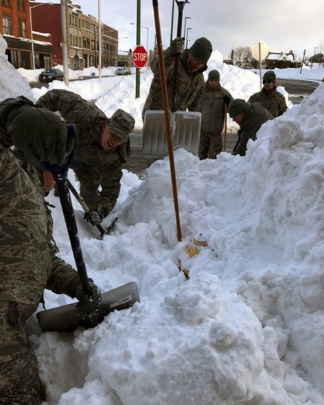 New York National Guard Soldiers and Airmen clear snow in Utica