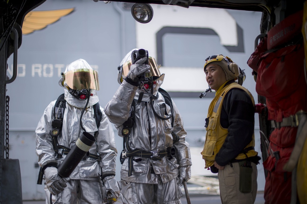 USS Bonhomme Richard (LHD 6) flight deck firefight training