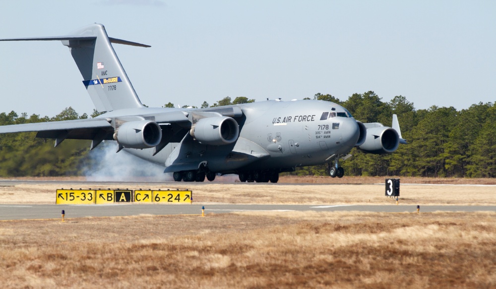 Air Force transports Army Reserve MPs to the fight