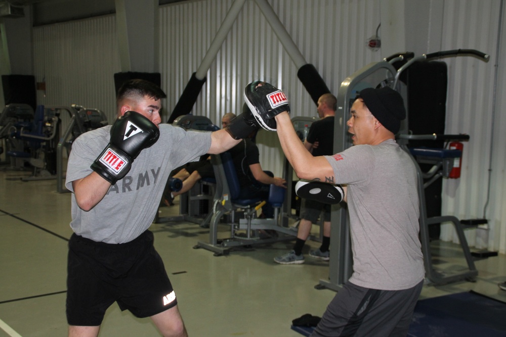 1-8 IN Soldiers take love of boxing to Romania