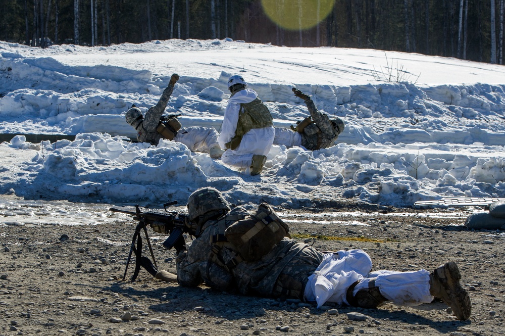 Spartan paratroopers conduct live-fire training at the infantry platoon battle course