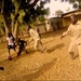 Soldier plays soccer at Cameroon orphanage
