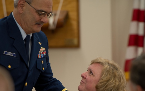 Connie Poore is presented flowers