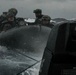 Marines ride waves