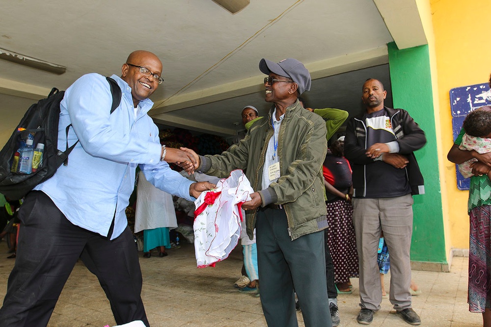 USARAF security planner for JA17 donates more than 400 articles of clothing to landslide survivors